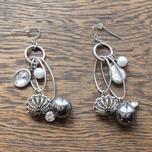 Earrings. Silvertone, bling. Kind of excessive, tbh